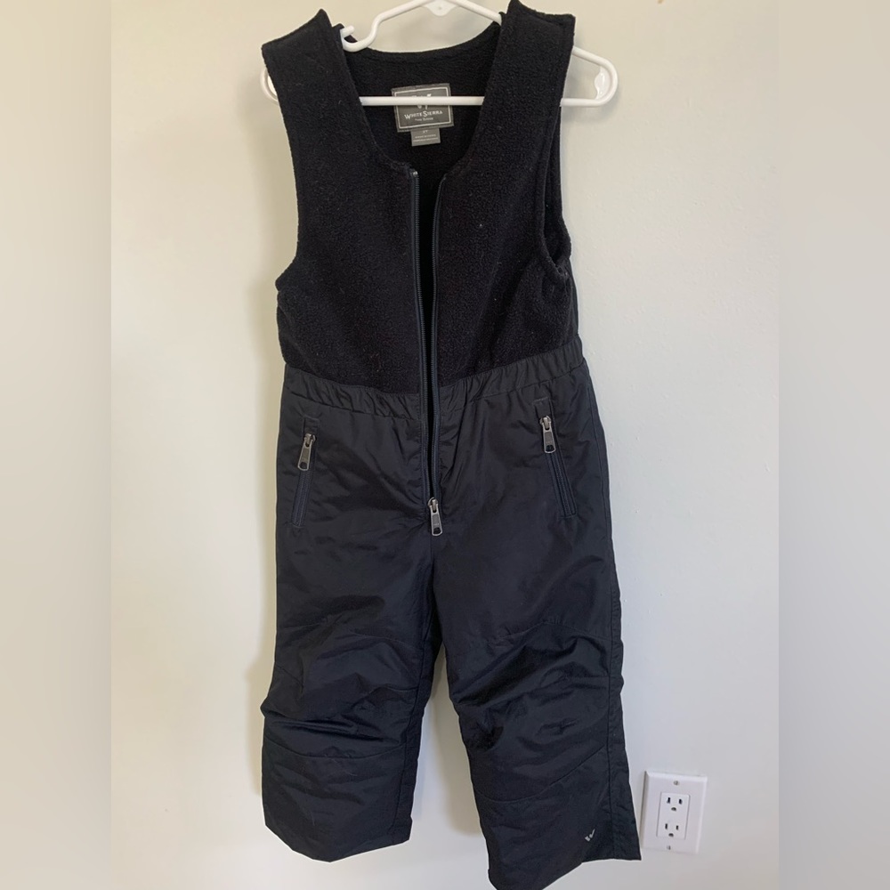 Black 3t zip up snow pants with adjustable Velcro shoulders
